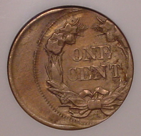 1866 Indian Head penny off-center strike error showing shifted design with blank planchet crescent